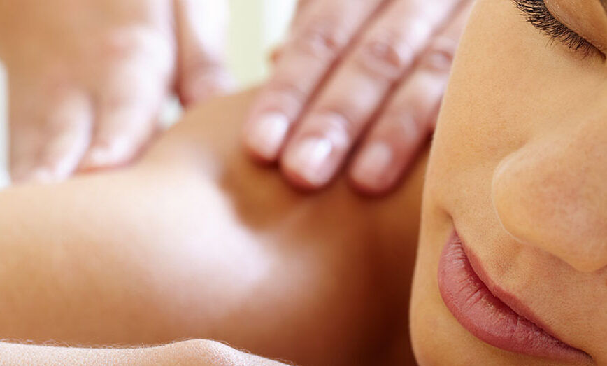 Lady relaxing having a back massage